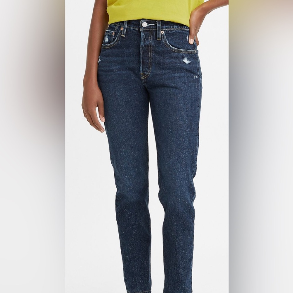 Levi’s 501 skinny cropped raw‎ hem dark wash jeans. Women size 26. Button fly.